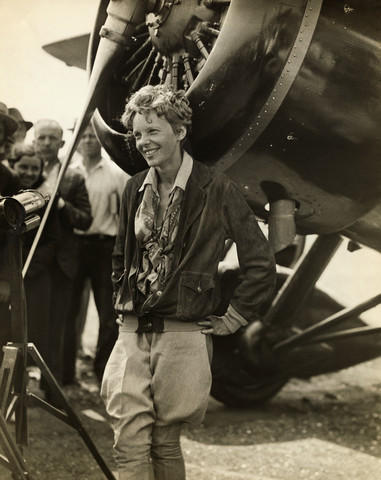 Aviation History | History of Flight | Aviation History Articles, Warbirds, Bombers, Trainers, Pilots | Amelia Earhart Beside Her Plane, ca. 1930s