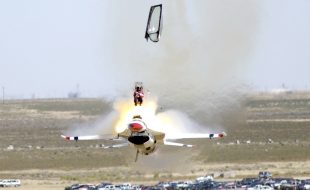 MOUNTAIN HOME AIR FORCE BASE, Idaho -- Capt. Christopher Stricklin ejects from the USAF Thunderbirds number six aircraft less than a second before it impacted the ground at an air show at Mountain Home Air Force Base, Idaho, Sept. 14. Stricklin, who was not injured, ejected after both guiding the jet away from the crowd of more than 60,000 people and ensuring he couldn't save the aircraft. This was only the second crash since the Air Force began using F-16 Falcons for its demonstration team in 1982. The ACES II ejection seat performed flawlessly. (U.S. Air Force photo by Staff Sgt. Bennie J. Davis III)